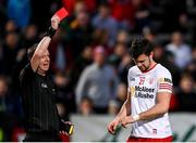 16 April 2022; Conor McKenna of Tyrone is shown a red card by referee Joe McQuillan during the Ulster GAA Football Senior Championship preliminary round match between Fermanagh and Tyrone at Brewster Park in Enniskillen, Fermanagh. Photo by Stephen McCarthy/Sportsfile