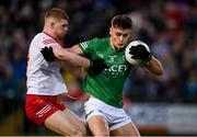 16 April 2022; Johnny Cassidy of Fermanagh in action against Cathal McShane of Tyrone during the Ulster GAA Football Senior Championship preliminary round match between Fermanagh and Tyrone at Brewster Park in Enniskillen, Fermanagh. Photo by Stephen McCarthy/Sportsfile