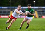 16 April 2022; Ryan Lyons of Fermanagh in action against Niall Sludden of Tyrone during the Ulster GAA Football Senior Championship preliminary round match between Fermanagh and Tyrone at Brewster Park in Enniskillen, Fermanagh. Photo by Stephen McCarthy/Sportsfile