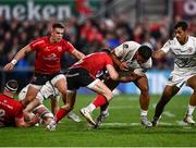 16 April 2022; Ethan McIlroy of Ulster rips the ball away from Peato Mauvaka of Toulouse during the Heineken Champions Cup Round of 16 Second Leg match between Ulster and Toulouse at Kingspan Stadium in Belfast. Photo by David Fitzgerald/Sportsfile