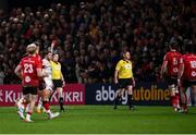 16 April 2022; Referee Matthew Carley shows a red card to Tom O'Toole of Ulster, right, during the Heineken Champions Cup Round of 16 Second Leg match between Ulster and Toulouse at Kingspan Stadium in Belfast. Photo by David Fitzgerald/Sportsfile