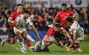 16 April 2022; Ethan McIlroy of Ulster is tackled by Pita Ahki, left, and Dimitri Delibes of Toulouse during the Heineken Champions Cup Round of 16 Second Leg match between Ulster and Toulouse at Kingspan Stadium in Belfast. Photo by Ramsey Cardy/Sportsfile
