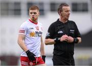 16 April 2022; Cathal McShane of Tyrone and referee Joe McQuillan during the Ulster GAA Football Senior Championship preliminary round match between Fermanagh and Tyrone at Brewster Park in Enniskillen, Fermanagh. Photo by Stephen McCarthy/Sportsfile