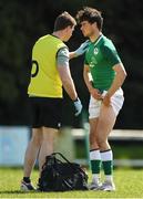 16 April 2022; James Nicholson of Ireland receives medical attention for an injury during the U19 Rugby International match between Ireland and France at Templeville Road in Dublin. Photo by Eóin Noonan/Sportsfile