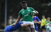 16 April 2022; Ihechi Oji of Ireland is tackled by Paul Costes of France during the U19 Rugby International match between Ireland and France at Templeville Road in Dublin. Photo by Eóin Noonan/Sportsfile