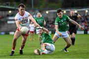 16 April 2022; Darragh Canavan of Tyrone in action against Declan McClusker and Luke Flanagan, right, of Fermanagh during the Ulster GAA Football Senior Championship preliminary round match between Fermanagh and Tyrone at Brewster Park in Enniskillen, Fermanagh. Photo by Stephen McCarthy/Sportsfile