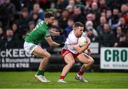 16 April 2022; Niall Sludden of Tyrone in action against James McMahon of Fermanagh during the Ulster GAA Football Senior Championship preliminary round match between Fermanagh and Tyrone at Brewster Park in Enniskillen, Fermanagh. Photo by Stephen McCarthy/Sportsfile