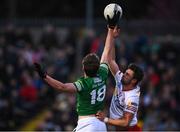 16 April 2022; Joe McDade of Fermanagh in action against Conor McKenna of Tyrone during the Ulster GAA Football Senior Championship preliminary round match between Fermanagh and Tyrone at Brewster Park in Enniskillen, Fermanagh. Photo by Stephen McCarthy/Sportsfile