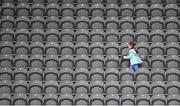 17 April 2022; A young supporter runs to find her seat before the Munster GAA Hurling Senior Championship Round 1 match between Cork and Limerick at Páirc Uí Chaoimh in Cork. Photo by Stephen McCarthy/Sportsfile