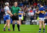 17 April 2022; Referee Johnny Murphy speaks to Dessie Hutchinson of Waterford and Cathal Barrett of Tipperary after an off the ball tussle during the Munster GAA Hurling Senior Championship Round 1 match between Waterford and Tipperary at Walsh Park in Waterford. Photo by Brendan Moran/Sportsfile