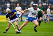 17 April 2022; Stephen Bennett of Waterford is tackled by Cathal Barrett of Tipperary during the Munster GAA Hurling Senior Championship Round 1 match between Waterford and Tipperary at Walsh Park in Waterford. Photo by Brendan Moran/Sportsfile