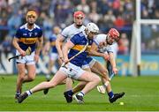 17 April 2022; Michael Breen of Tipperary is tackled by Jack Fagan of Waterford during the Munster GAA Hurling Senior Championship Round 1 match between Waterford and Tipperary at Walsh Park in Waterford. Photo by Brendan Moran/Sportsfile Photo by Brendan Moran/Sportsfile