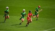 17 April 2022; Michelle Murphy of Cork in action against Kerry players, from left, Patrice Diggin, Ellen O'Donoghue and Elaine Ryall during the Munster Intermediate Camogie Championship Final match between Cork and Kerry at Páirc Uí Chaoimh in Cork. Photo by Ray McManus/Sportsfile