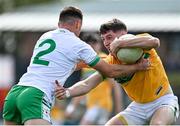 17 April 2022; Conor Dolan of Leitrim in action against Eoin Walsh of London during the Connacht GAA Football Senior Championship Quarter-Final match between London and Leitrim at McGovern Park in Ruislip, London, England. Photo by Sam Barnes/Sportsfile