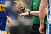 17 April 2022; Referee Johnny Murphy perfoms the coin toss with team captains Ronan Maher of Tipperary and Conor Prunty of Waterford before the Munster GAA Hurling Senior Championship Round 1 match between Waterford and Tipperary at Walsh Park in Waterford. Photo by Piaras Ó Mídheach/Sportsfile