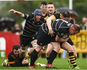 17 April 2022; Conor Dempsey of Kilkenny is tackled by Adam Martin of Ashbourne during the Bank of Ireland Leinster Rugby Provincial Towns Cup Final match between Ashbourne RFC and Kilkenny RFC at Cill Dara RFC in Kildare. Photo by Harry Murphy/Sportsfile