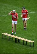 17 April 2022; Cork players, Tim O’Mahony, left, and Mark Coleman make their way to the bench for the team picture before the Munster GAA Hurling Senior Championship Round 1 match between Cork and Limerick at Páirc Uí Chaoimh in Cork. Photo by Stephen McCarthy/Sportsfile