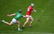 17 April 2022; Damien Cahalane of Cork scores his side's first goal despite the efforts of Sean Finn of Limerick during the Munster GAA Hurling Senior Championship Round 1 match between Cork and Limerick at Páirc Uí Chaoimh in Cork. Photo by Stephen McCarthy/Sportsfile