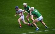17 April 2022; Cork goalkeeper Patrick Collins is tackled by Cian Lynch,left, and Kyle Hayes of Limerick during the Munster GAA Hurling Senior Championship Round 1 match between Cork and Limerick at Páirc Uí Chaoimh in Cork. Photo by Stephen McCarthy/Sportsfile