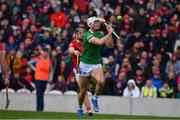 17 April 2022; Kyle Hayes of Limerick evades Mark Coleman of Cork on his way to score a goal, in the 15th minute during the Munster GAA Hurling Senior Championship Round 1 match between Cork and Limerick at Páirc Uí Chaoimh in Cork. Photo by Ray McManus/Sportsfile