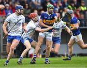 17 April 2022; Noel McGrath of Tipperary is tackled by Tadhg De Búrca of Waterford during the Munster GAA Hurling Senior Championship Round 1 match between Waterford and Tipperary at Walsh Park in Waterford. Photo by Piaras Ó Mídheach/Sportsfile