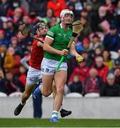 17 April 2022; Kyle Hayes of Limerick evades Mark Coleman of Cork on his way to score a goal, in the 15th minute during the Munster GAA Hurling Senior Championship Round 1 match between Cork and Limerick at Páirc Uí Chaoimh in Cork. Photo by Ray McManus/Sportsfile