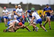 17 April 2022; Tadhg De Búrca of Waterford is tackled by Alan Flynn of Tipperary during the Munster GAA Hurling Senior Championship Round 1 match between Waterford and Tipperary at Walsh Park in Waterford. Photo by Piaras Ó Mídheach/Sportsfile