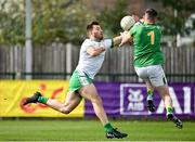 17 April 2022; James Gallagher of London in action against Leitrim goalkeeper Darren Maxwell during the Connacht GAA Football Senior Championship Quarter-Final match between London and Leitrim at McGovern Park in Ruislip, London, England. Photo by Sam Barnes/Sportsfile