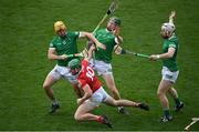 17 April 2022; Robbie O’Flynn of Cork in action against Limerick players, from left, Tom Morrisey, William O'Donoghue and Cian Lynch during the Munster GAA Hurling Senior Championship Round 1 match between Cork and Limerick at Páirc Uí Chaoimh in Cork. Photo by Stephen McCarthy/Sportsfile