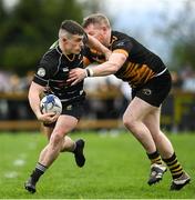 17 April 2022; Hugh Corkery of Kilkenny is tackled by Ciaran Roche of Ashbourne during the Bank of Ireland Leinster Rugby Provincial Towns Cup Final match between Ashbourne RFC and Kilkenny RFC at Cill Dara RFC in Kildare. Photo by Harry Murphy/Sportsfile