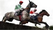 17 April 2022; Riviere D'etel, left, with Jack Kennedy up, and Master McShee, with Ian Power up, during the BoyleSports Gold Cup Novice Steeplechase during day two of the Fairyhouse Easter Festival at the Fairyhouse Racecourse in Ratoath, Meath. Photo by Seb Daly/Sportsfile