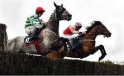 17 April 2022; Riviere D'etel, left, with Jack Kennedy up, and Master McShee, with Ian Power up, during the BoyleSports Gold Cup Novice Steeplechase during day two of the Fairyhouse Easter Festival at the Fairyhouse Racecourse in Ratoath, Meath. Photo by Seb Daly/Sportsfile