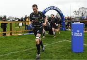 17 April 2022; Wes Carter of Kilkenny runs out past the trophy before the Bank of Ireland Leinster Rugby Provincial Towns Cup Final match between Ashbourne RFC and Kilkenny RFC at Cill Dara RFC in Kildare. Photo by Harry Murphy/Sportsfile