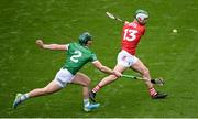 17 April 2022; Shane Kingston of Cork shoots to score his side's first goal despite the attention of of Sean Finn of Limerick during the Munster GAA Hurling Senior Championship Round 1 match between Cork and Limerick at Páirc Uí Chaoimh in Cork. Photo by Stephen McCarthy/Sportsfile