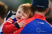 17 April 2022; New York manager Johnny McGeeney carries his son Tom, aged 2, after the Connacht GAA Football Senior Championship Quarter-Final match between New York and Sligo at Gaelic Park in New York, USA. Photo by Daire Brennan/Sportsfile