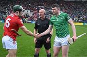 17 April 2022; The Cork captain Mark Coleman with referee John Keenan and the Limerick captain Declan Hannon before the Munster GAA Hurling Senior Championship Round 1 match between Cork and Limerick at Páirc Uí Chaoimh in Cork. Photo by Ray McManus/Sportsfile