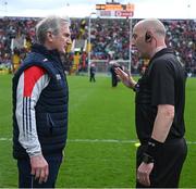 17 April 2022; Referee John Keenan in conversation with Cork manager Kieran Kingston before the Munster GAA Hurling Senior Championship Round 1 match between Cork and Limerick at Páirc Uí Chaoimh in Cork. Photo by Ray McManus/Sportsfile