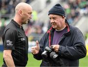 17 April 2022; Match referee John Keenan in conversation with photographer George Hatchell beforethe Munster GAA Hurling Senior Championship Round 1 match between Cork and Limerick at Páirc Uí Chaoimh in Cork. Photo by Ray McManus/Sportsfile