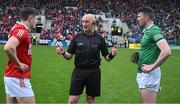 17 April 2022; The Cork captain Mark Coleman with referee John Keenan and the Limerick captain Declan Hannon before the Munster GAA Hurling Senior Championship Round 1 match between Cork and Limerick at Páirc Uí Chaoimh in Cork. Photo by Ray McManus/Sportsfile