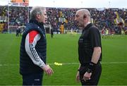 17 April 2022; Referee John Keenan in conversation with Cork manager Kieran Kingston before the Munster GAA Hurling Senior Championship Round 1 match between Cork and Limerick at Páirc Uí Chaoimh in Cork. Photo by Ray McManus/Sportsfile