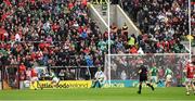 17 April 2022; Supporters on the terraces look on as Shane Kingston of Cork shoots to score his side's first goal despite the attention of Sean Finn of Limerick during the Munster GAA Hurling Senior Championship Round 1 match between Cork and Limerick at Páirc Uí Chaoimh in Cork.  Photo by Ray McManus/Sportsfile