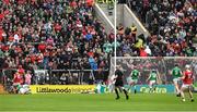 17 April 2022; Shane Kingston of Cork shoots past Sean Finn of Limerick and goalkeeper Nickie Quaid to score a goal in the first minute of the Munster GAA Hurling Senior Championship Round 1 match between Cork and Limerick at Páirc Uí Chaoimh in Cork.  Photo by Ray McManus/Sportsfile