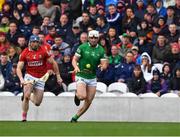 17 April 2022; Aaron Gillane of Limerick races clear of Sean O’Donoghue of Cork during the Munster GAA Hurling Senior Championship Round 1 match between Cork and Limerick at Páirc Uí Chaoimh in Cork. Photo by Ray McManus/Sportsfile