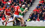 17 April 2022; Aaron Gillane of Limerick races clear of Sean O’Donoghue of Cork and shoots past Damien Cahalane during the Munster GAA Hurling Senior Championship Round 1 match between Cork and Limerick at Páirc Uí Chaoimh in Cork. Photo by Ray McManus/Sportsfile