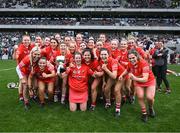 17 April 2022; The victorious Cork captain, Finola Neville, and her team mates celebrate with the cup after the Munster Intermediate Camogie Championship Final match between Cork and Kerry at Páirc Uí Chaoimh in Cork. Photo by Ray McManus/Sportsfile