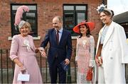 18 April 2022; An Taoiseach Micheál Martin TD with racegoers, from left, Gemma McDonagh, from Headford, Galway, Clare Conlon, from Mullaghbawn, Armagh, and Rita Doyle, from Gorey, Wexford, during day three of the Fairyhouse Easter Festival at Fairyhouse Racecourse in Ratoath, Meath. Photo by Seb Daly/Sportsfile