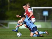 18 April 2022; Ronan Coughlan of St Patrick's Athletic in action against Sean Brennan, right, and Eoin Farrell of UCD during the SSE Airtricity League Premier Division match between UCD and St Patrick's Athletic at UCD Bowl in Belfield, Dublin. Photo by David Fitzgerald/Sportsfile