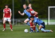 18 April 2022; Ronan Coughlan of St Patrick's Athletic in action against Sean Brennan, right, and Eoin Farrell of UCD during the SSE Airtricity League Premier Division match between UCD and St Patrick's Athletic at UCD Bowl in Belfield, Dublin. Photo by David Fitzgerald/Sportsfile
