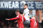 18 April 2022; Jordan Flores of Bohemians in action against Jonathan Lunney, left, and Shane Farrell of Shelbourne during the SSE Airtricity League Premier Division match between Shelbourne and Bohemians at Tolka Park in Dublin. Photo by Stephen McCarthy/Sportsfile