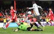 18 April 2022; Junior Ogedi-Uzokwe of Bohemians in action against Shelbourne goalkeeper Brendan Clarke during the SSE Airtricity League Premier Division match between Shelbourne and Bohemians at Tolka Park in Dublin. Photo by Stephen McCarthy/Sportsfile